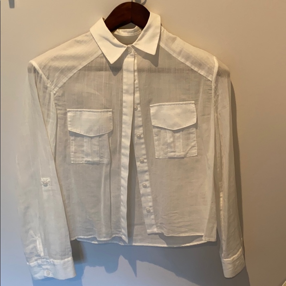 Lightly worn Alice and Olivia white top